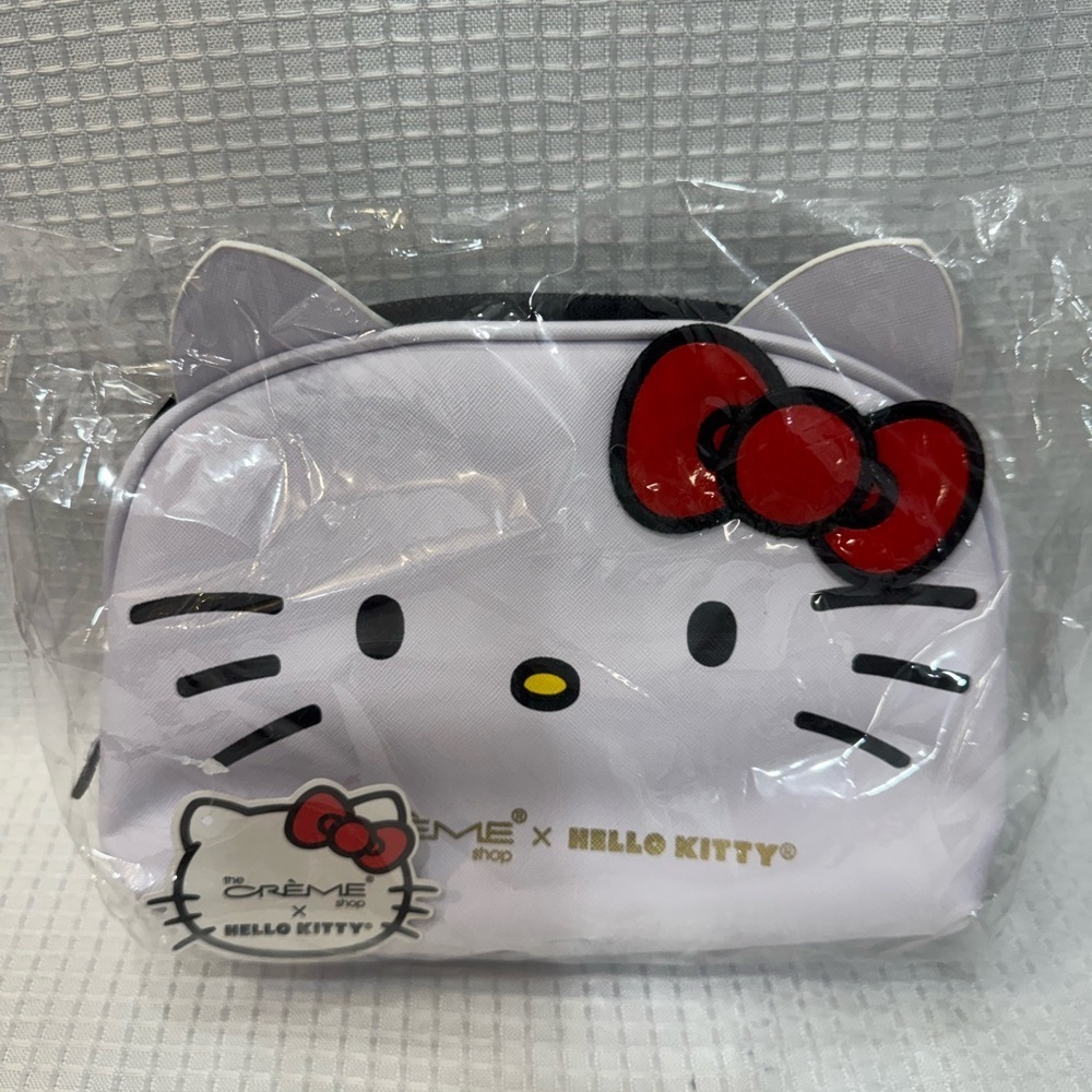 Hello Kitty and The Cream shop White Dome makeup travel pouch with Red Bow